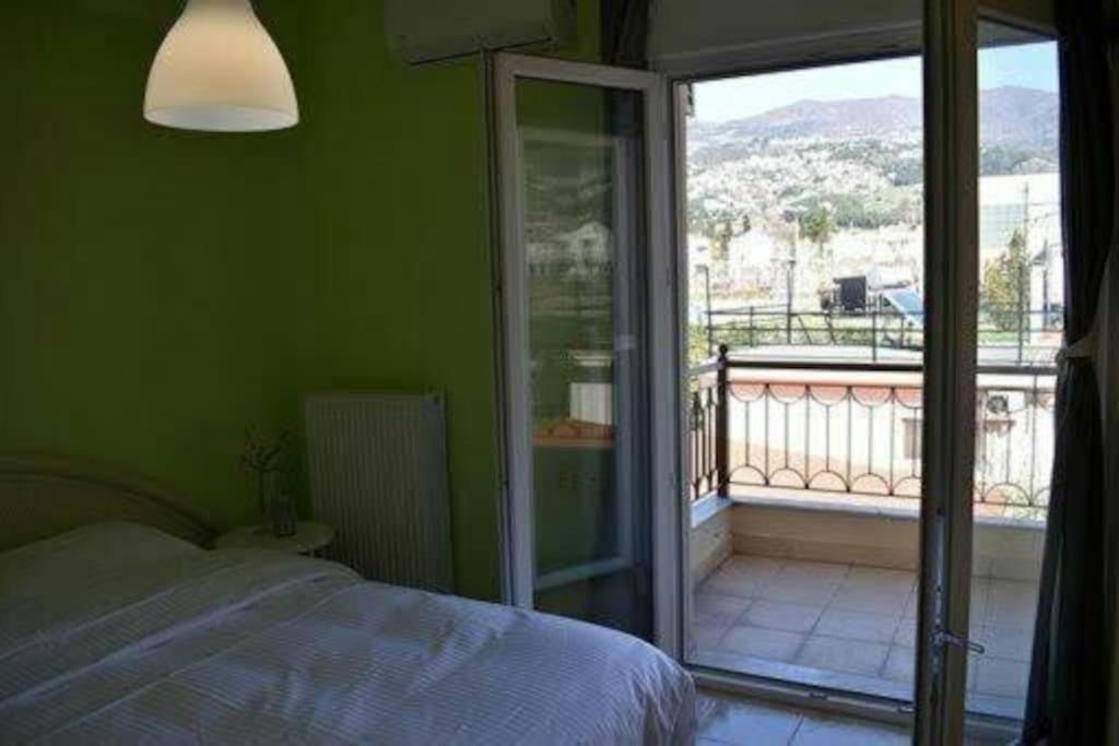 Posteľ alebo postele v izbe v ubytovaní jazzyhome in Volos