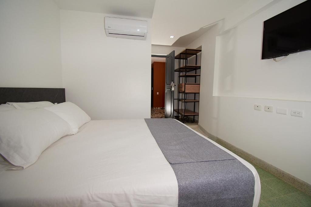 Postel nebo postele na pokoji v ubytování Brana by Bernalo Hotels