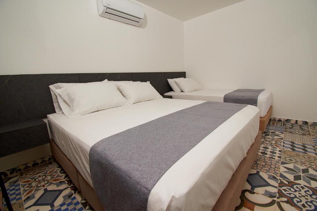 Postel nebo postele na pokoji v ubytování Brana by Bernalo Hotels
