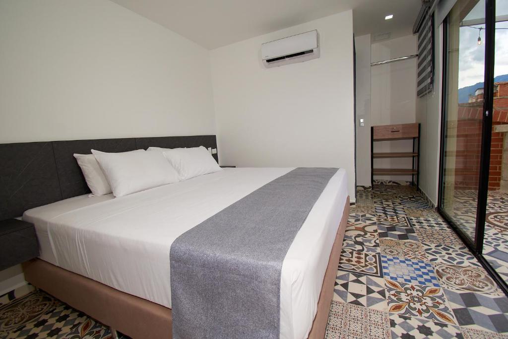 Postel nebo postele na pokoji v ubytování Brana by Bernalo Hotels