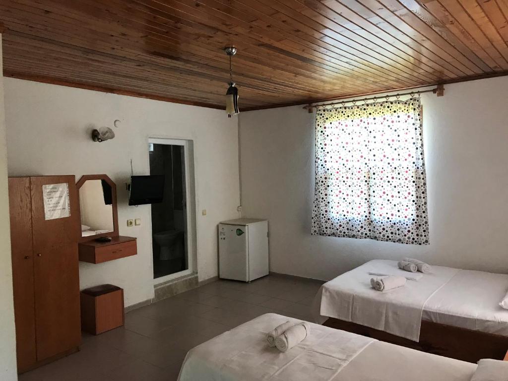 Postel nebo postele na pokoji v ubytování Cirali Irmak Hotel