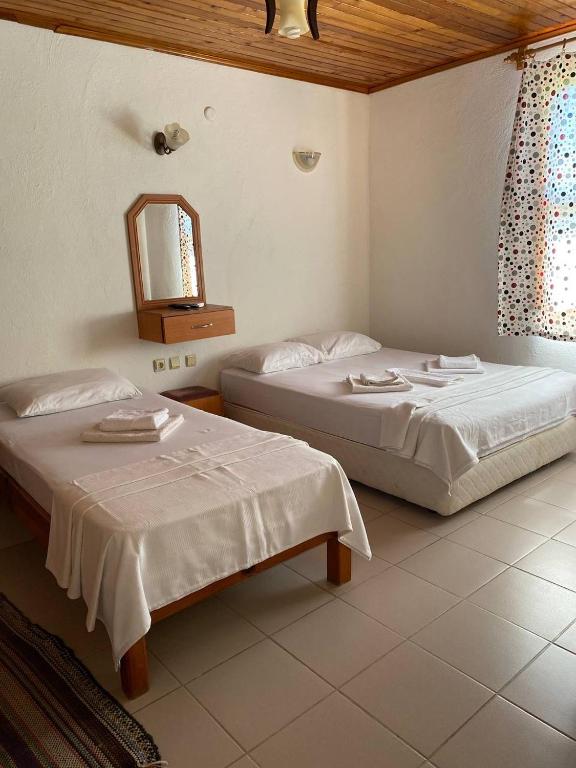 Postel nebo postele na pokoji v ubytování Cirali Irmak Hotel