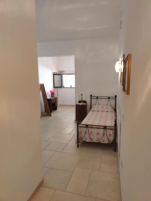 A bed or beds in a room at La Nuova Casetta
