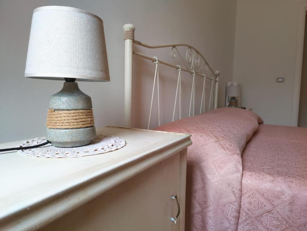 A bed or beds in a room at La Nuova Casetta