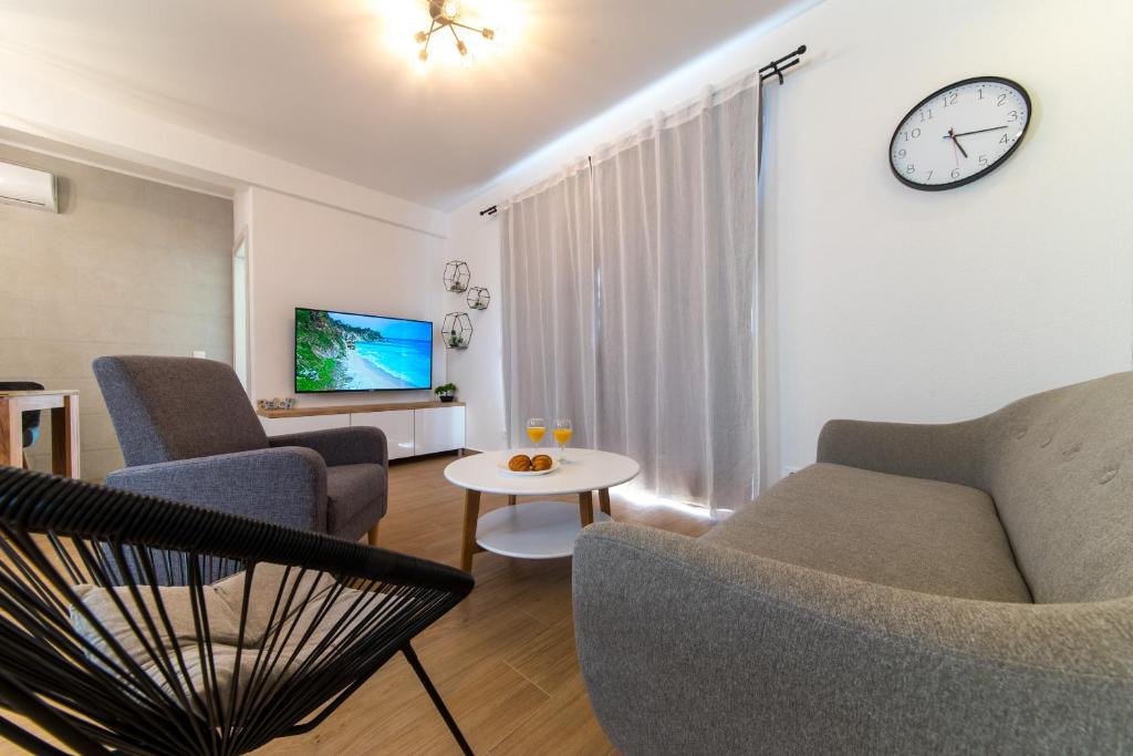 Televízia a/alebo spoločenská miestnosť v ubytovaní Apartment MARE