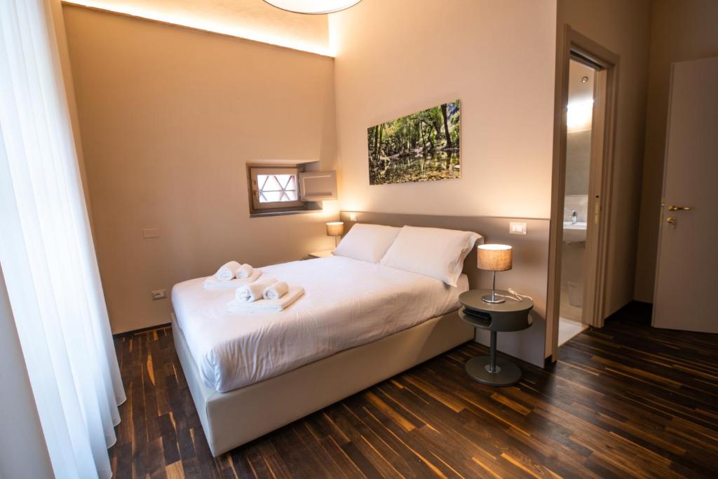 Łóżko lub łóżka w pokoju w obiekcie Il Pradicciolo Agriturismo
