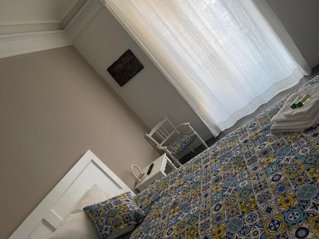 Posteľ alebo postele v izbe v ubytovaní Sikelia-sicilian rooms