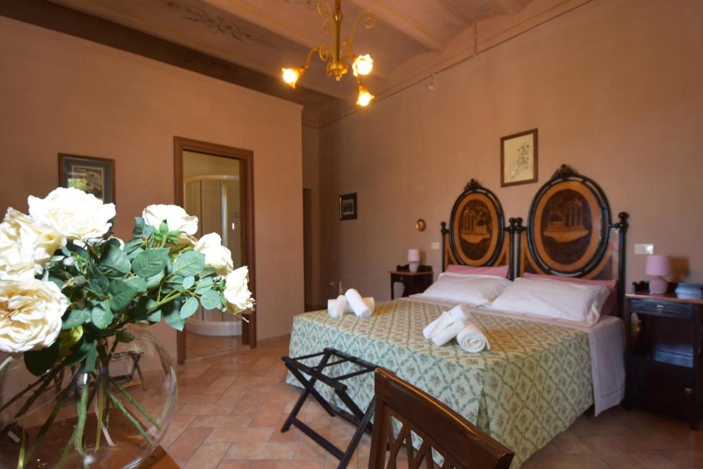 Łóżko lub łóżka w pokoju w obiekcie AGRITURISMO Villino Bellavista