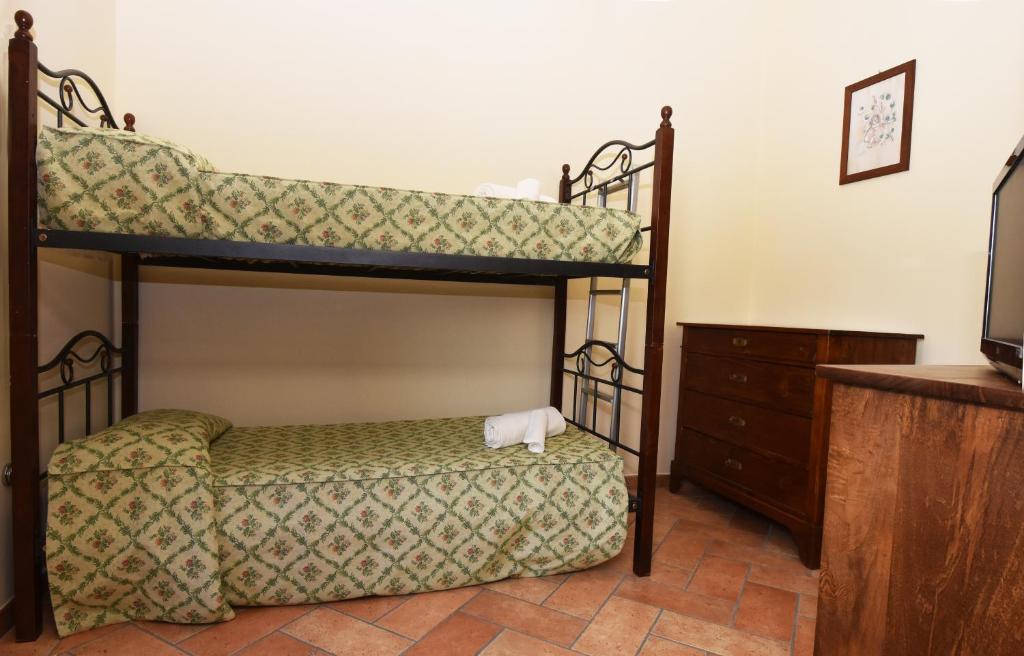 Łóżko lub łóżka w pokoju w obiekcie AGRITURISMO Villino Bellavista