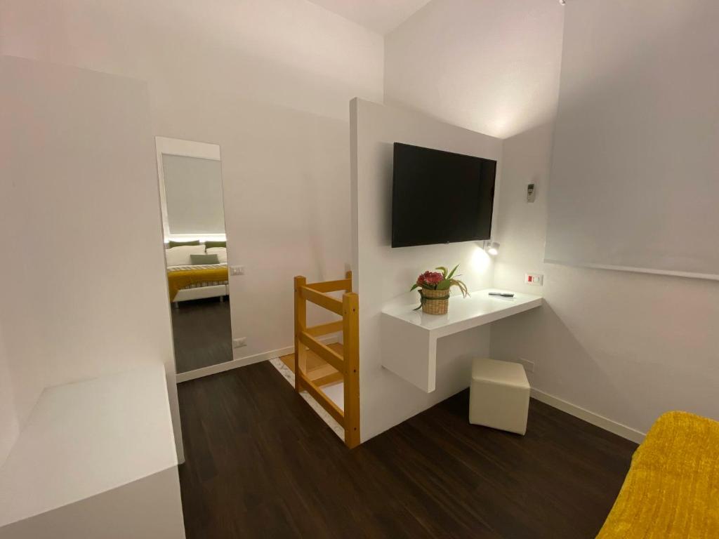 Telewizja i/lub zestaw kina domowego w obiekcie Soggiorno Lo Stellino