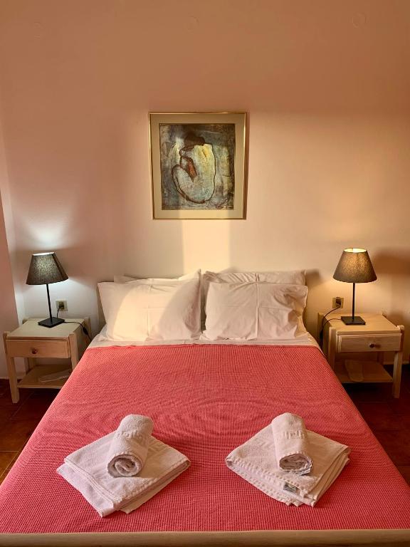 Postel nebo postele na pokoji v ubytování Romanza Villas