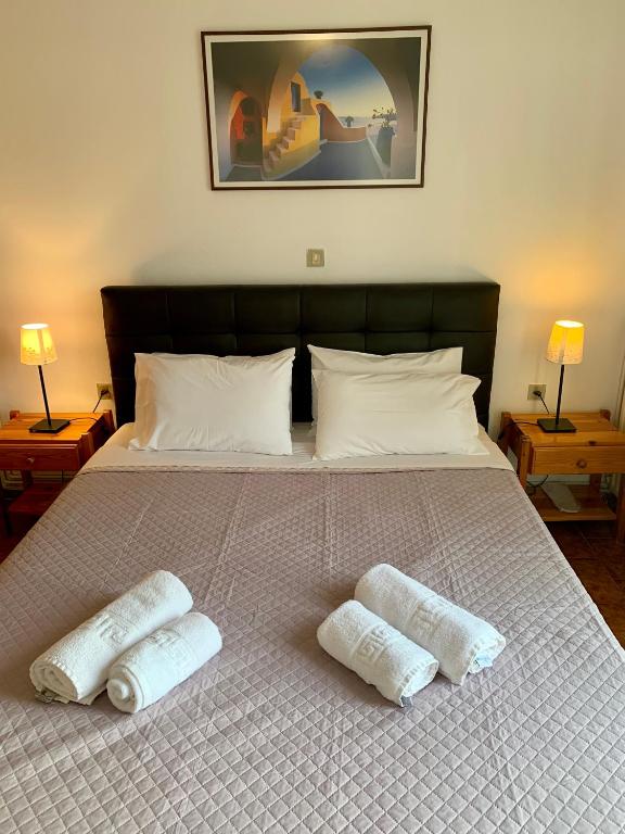 Postel nebo postele na pokoji v ubytování Romanza Villas
