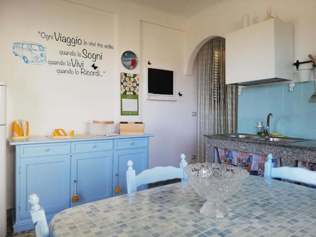 A kitchen or kitchenette at GIADA MARIA SOLE HOUSE