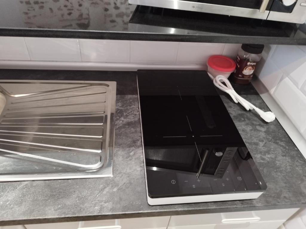 Kuchyňa alebo kuchynka v ubytovaní Altozano Room III, Estudió centro de Málaga Gayfriendly, Wi-Fi gratis