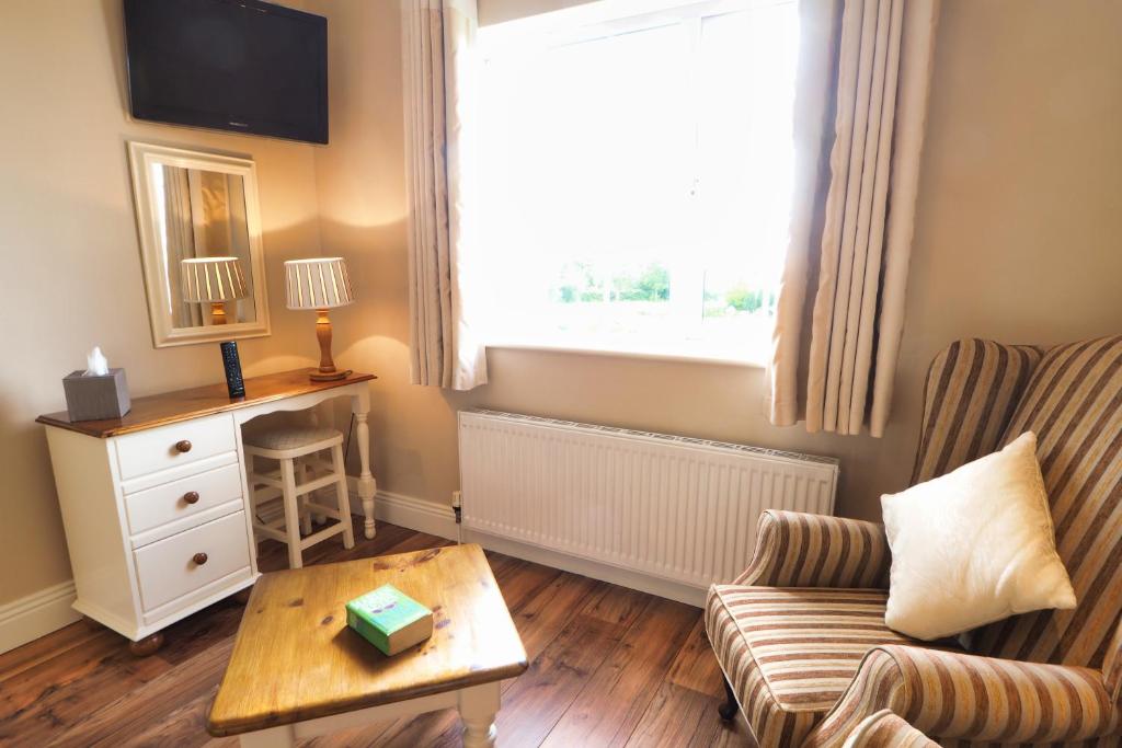 Posezení v ubytování Hillcrest Luxury Apartment