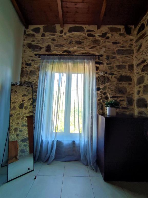 Fotografia z galérie ubytovania Grandma Agatha & Virginia's stonehouse v destinácii Kefálion