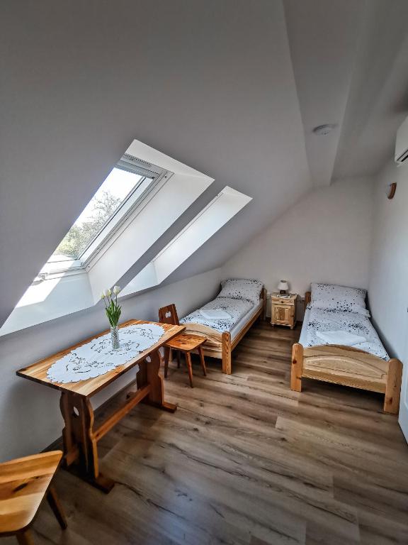 Postel nebo postele na pokoji v ubytování U Matůšků