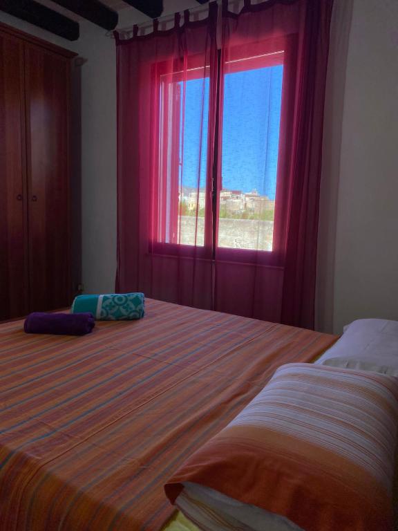 Postel nebo postele na pokoji v ubytování La casa di Andrea