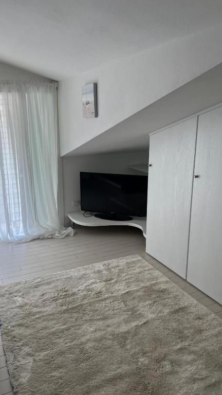 TV a/nebo společenská místnost v ubytování B&B El Dorado