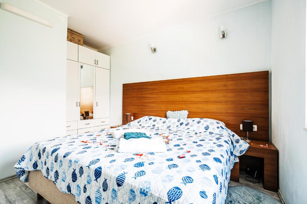 Postel nebo postele na pokoji v ubytování Green Hill Apartment