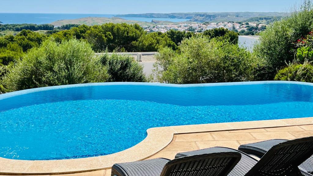 Bazén v ubytování Villas Tin Coves Noves nebo v jeho okolí