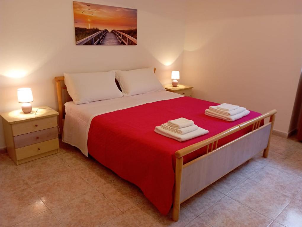 En eller flere senge i et værelse på Meridiana 3