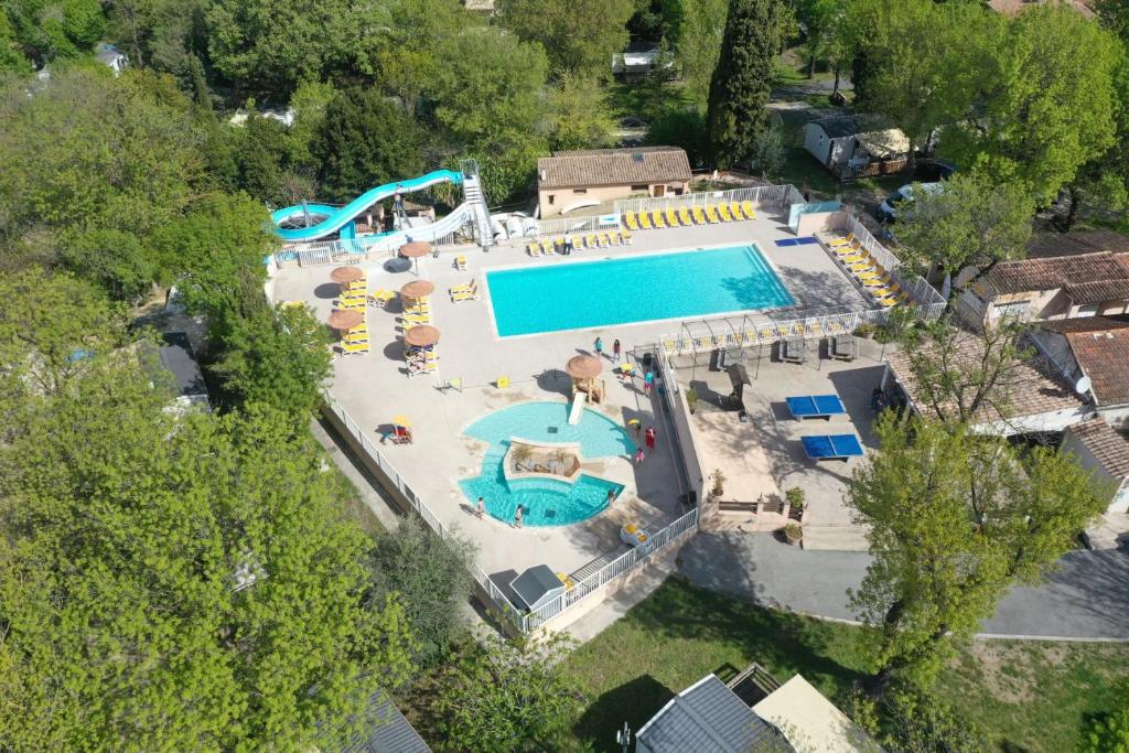 an overhead view of a swimming pool in a resort at Camping Parc Bellevue in Cannes
