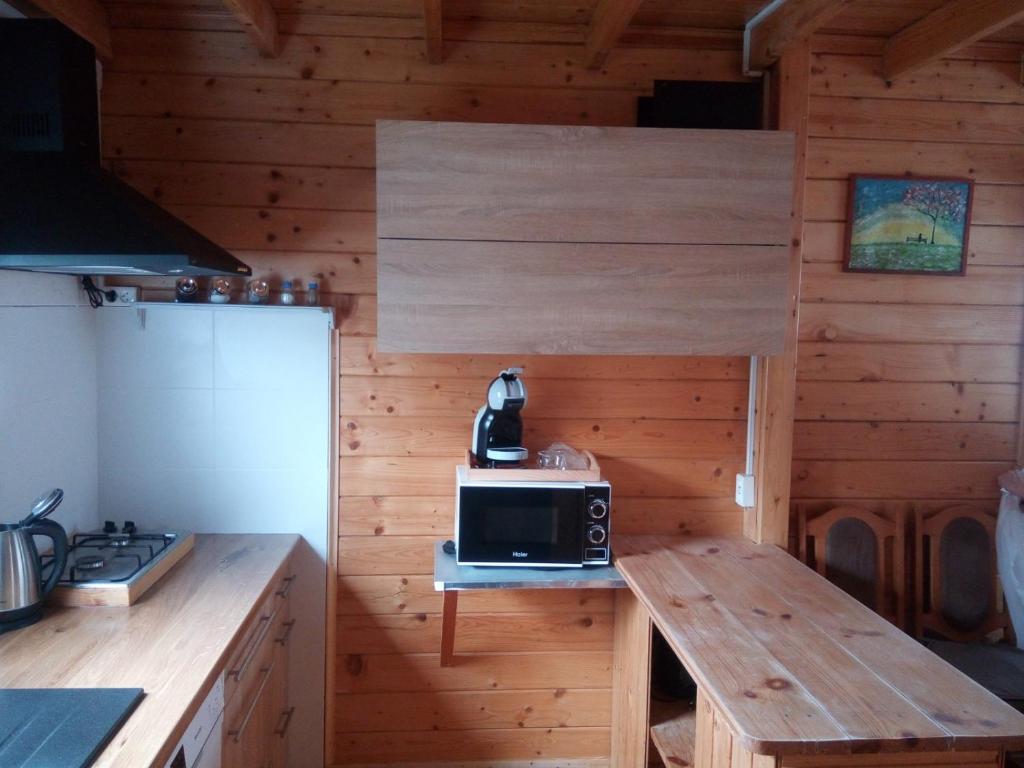 Kuchyň nebo kuchyňský kout v ubytování Domek letniskowy