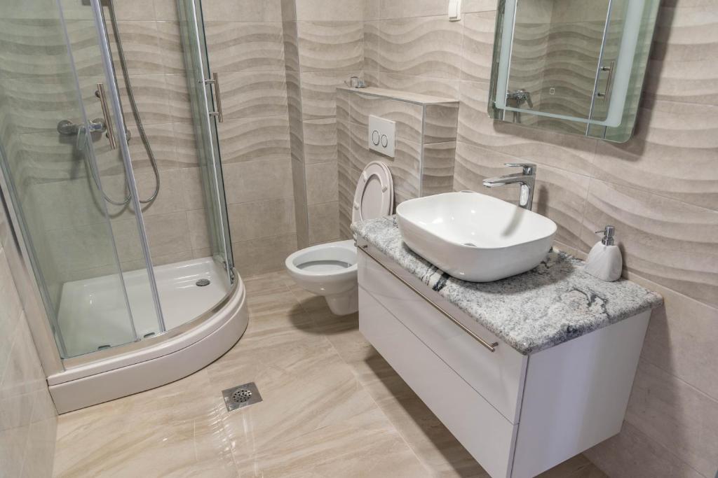 Kúpeľňa v ubytovaní Apartmani Dalmacija Drage