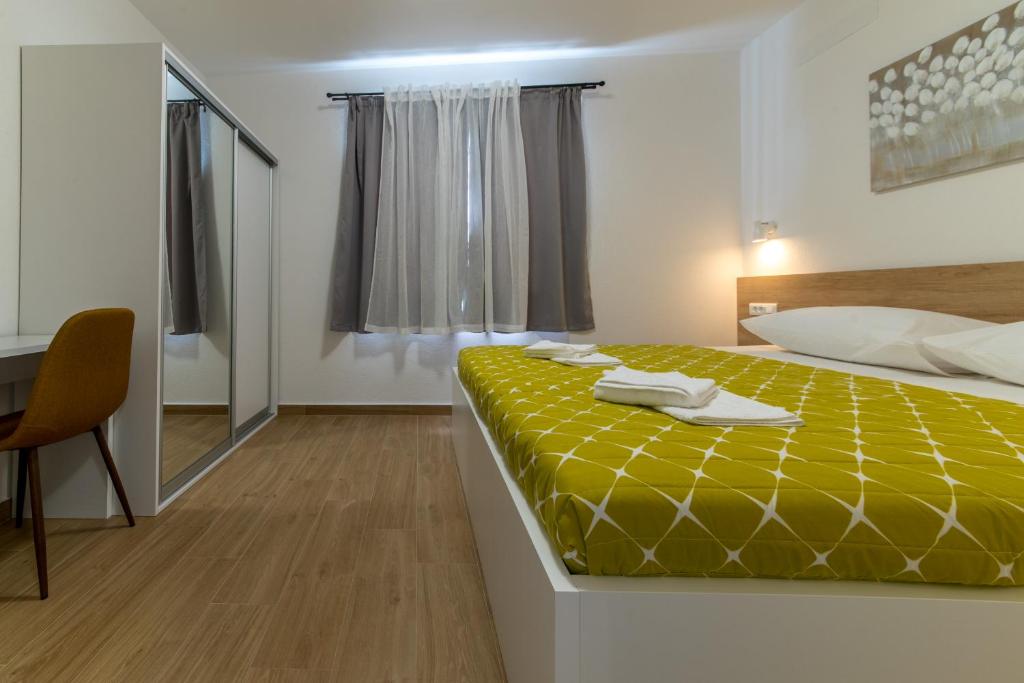 Posteľ alebo postele v izbe v ubytovaní Apartment MARE
