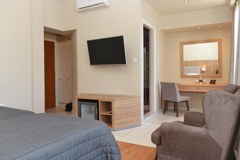 TV a/nebo společenská místnost v ubytování Hotel Hermes