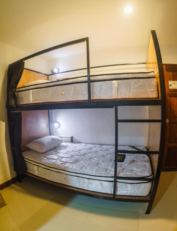 Postel nebo postele na pokoji v ubytování NITRO HOUSE Hostel
