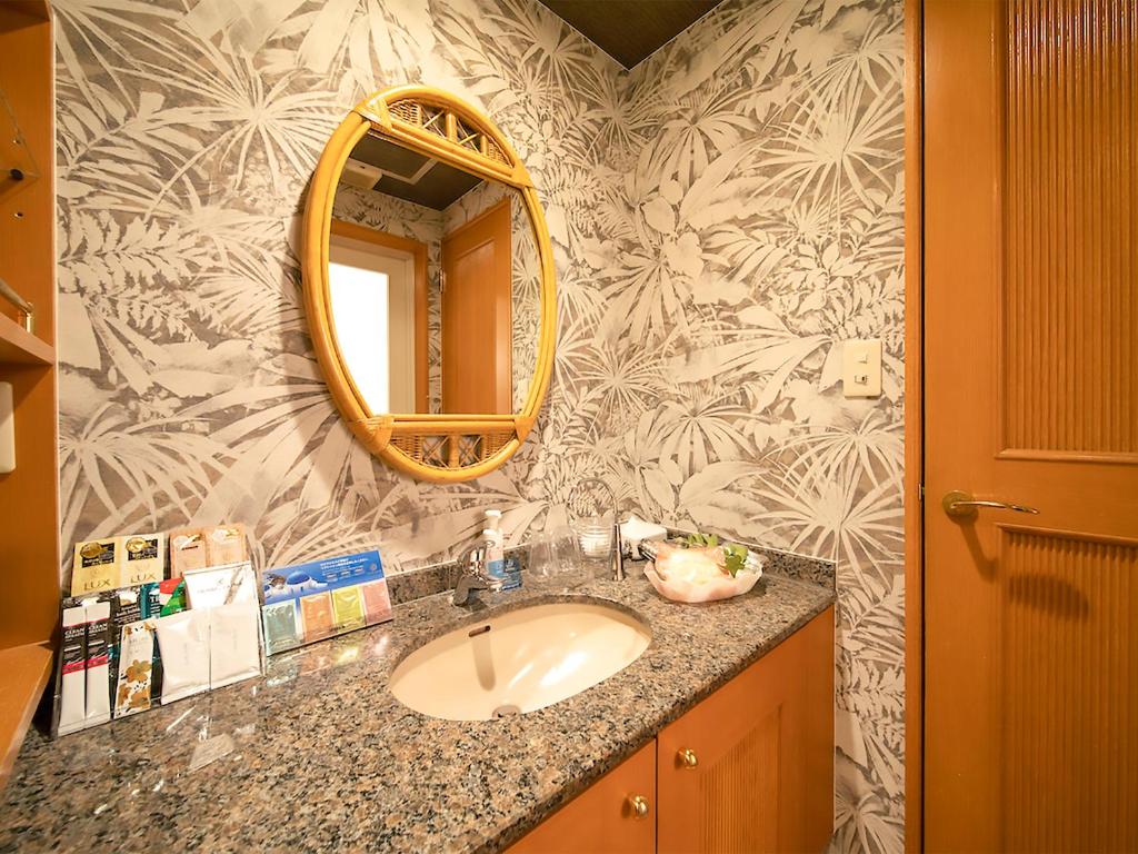 Koupelna v ubytování Hotel Rocco (Adult Only)