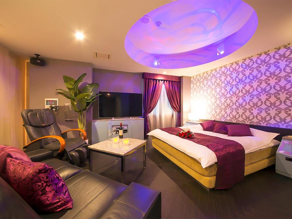 Postel nebo postele na pokoji v ubytování Hotel Rocco (Adult Only)