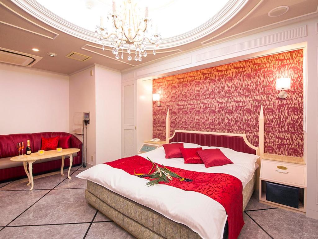 Postel nebo postele na pokoji v ubytování Hotel Rocco (Adult Only)
