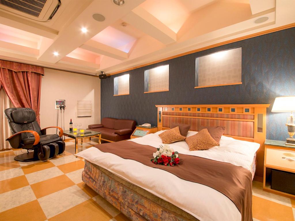 Postel nebo postele na pokoji v ubytování Hotel Rocco (Adult Only)