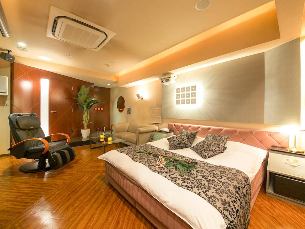 Postel nebo postele na pokoji v ubytování Hotel Rocco (Adult Only)