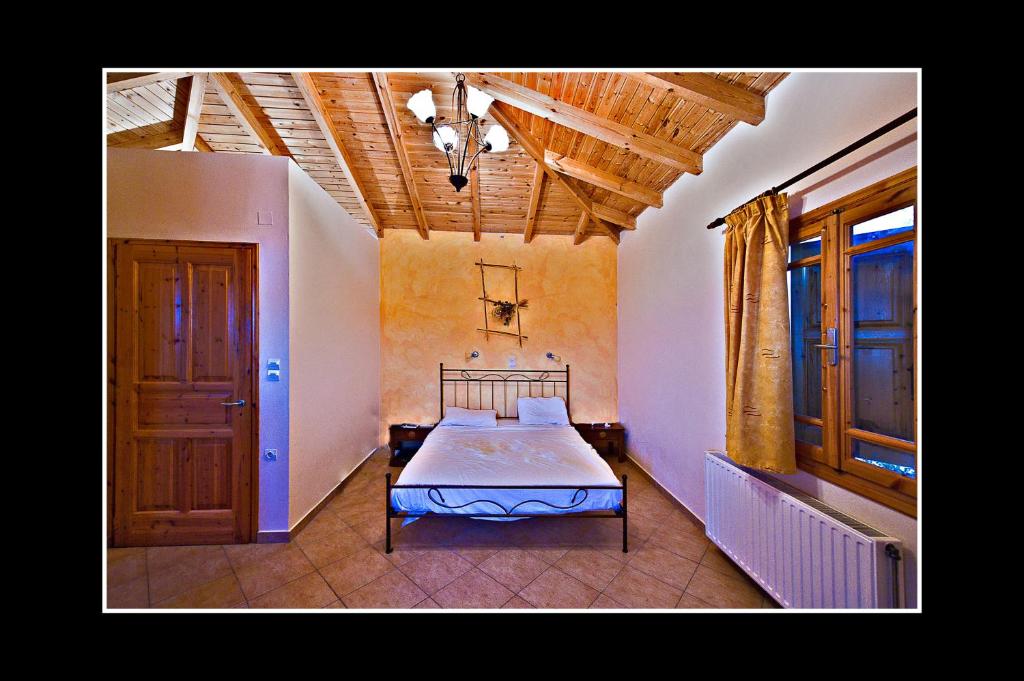 Posteľ alebo postele v izbe v ubytovaní Διαμέρισμα 4 ατόμων-Cozy Family apartment close to the most beautiful beaches