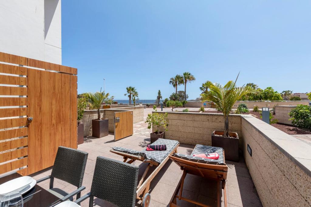 A balcony or terrace at MEDANO4YOU Ocean Family Dream Holiday Home