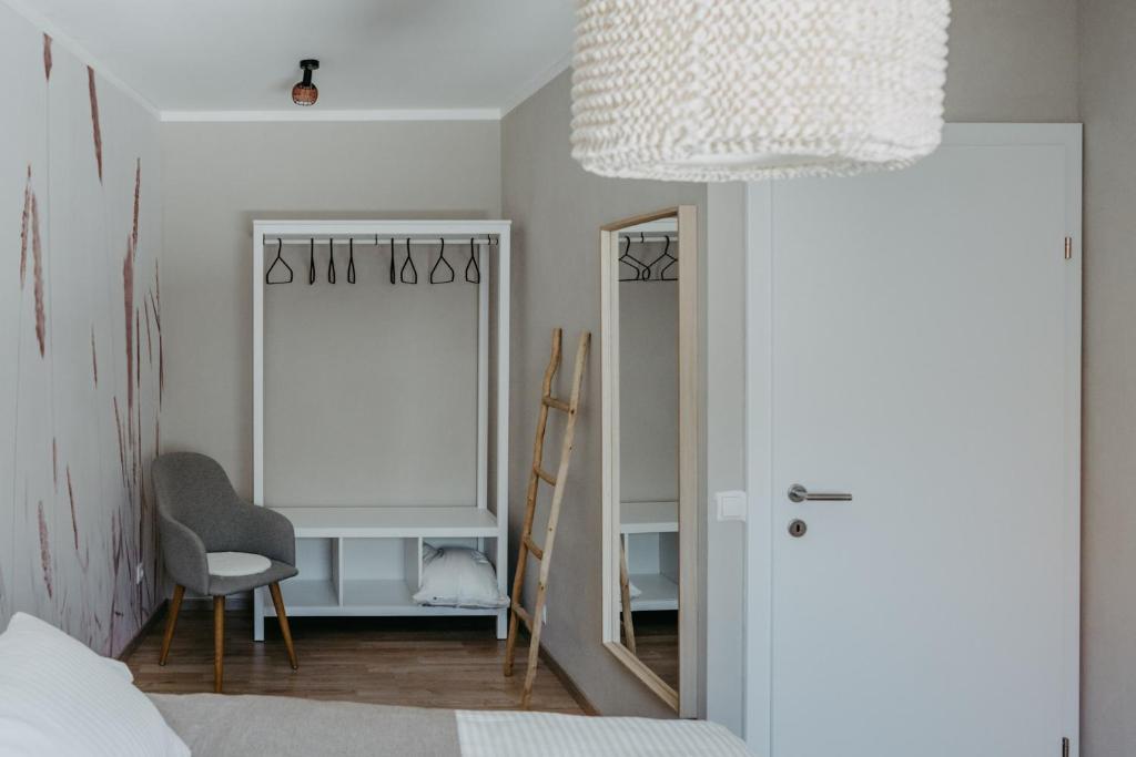 Postel nebo postele na pokoji v ubytování Haus Mörbisch