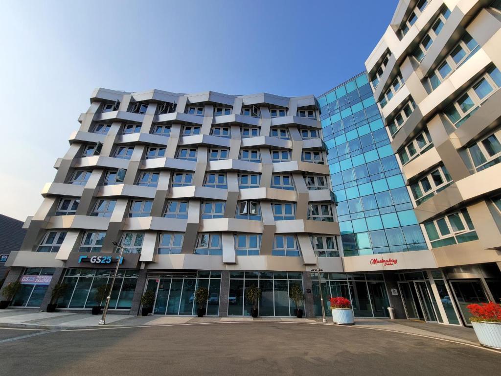 a large building with a lot of windows at Chungchoho Best Hotel in Sokcho