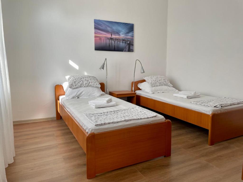 Posteľ alebo postele v izbe v ubytovaní Apartman Zablace