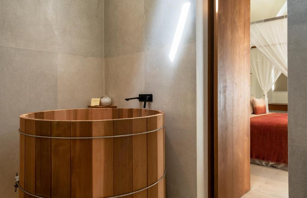 Postel nebo postele na pokoji v ubytování Bisma Eight Villas