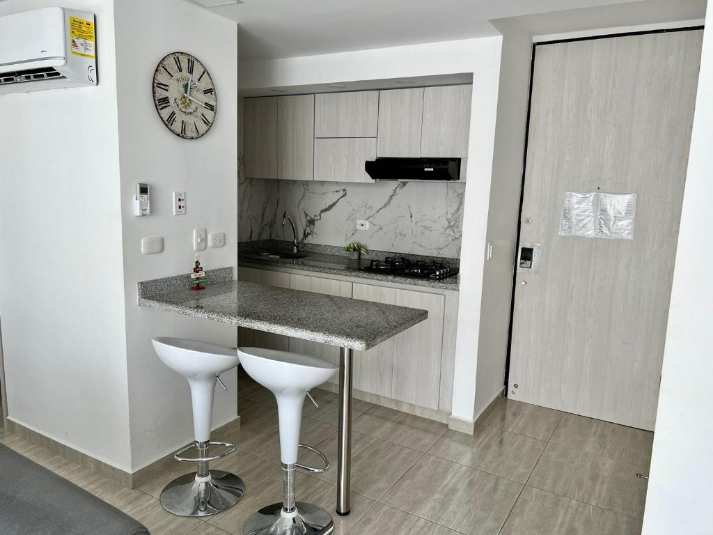 Kuchyň nebo kuchyňský kout v ubytování RICAURTE, Moderno, confortable apto, AC, Parquead, Wifi