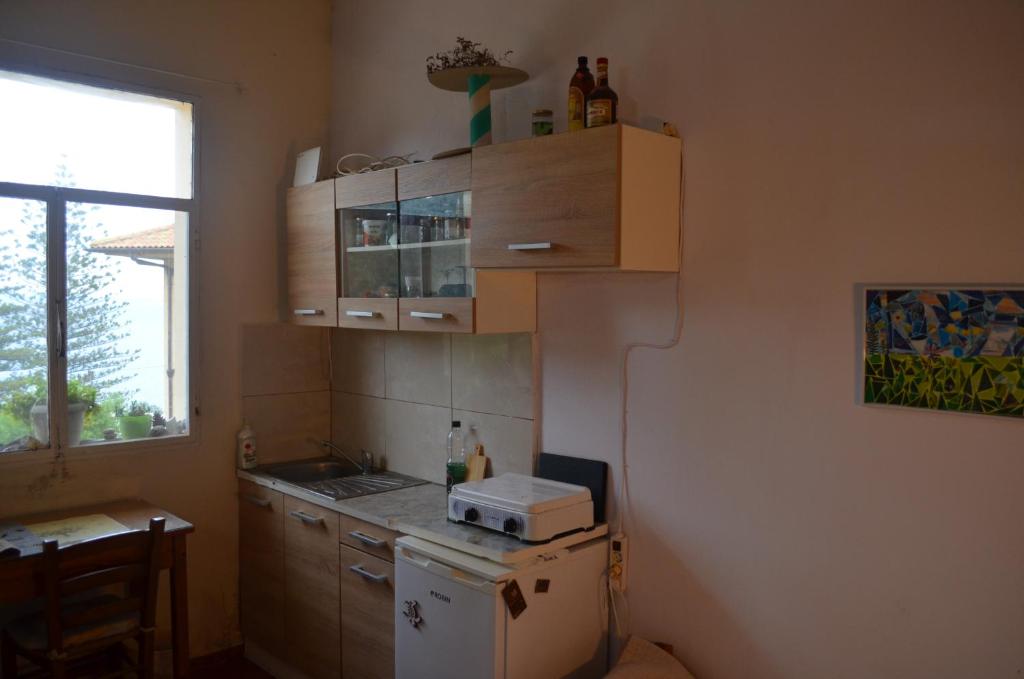 Kuchyň nebo kuchyňský kout v ubytování Nick Apartment