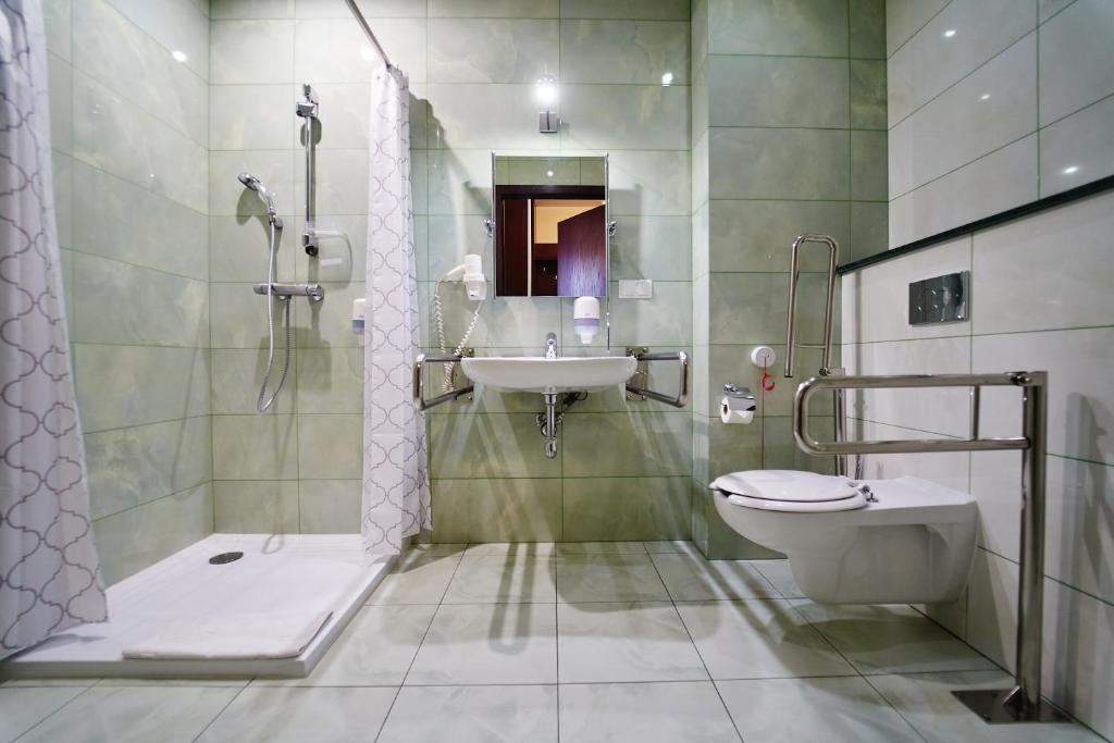 Koupelna v ubytování Hotel Szyszko