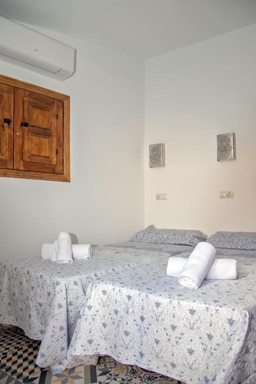 Postel nebo postele na pokoji v ubytování LA CASA MORISCA