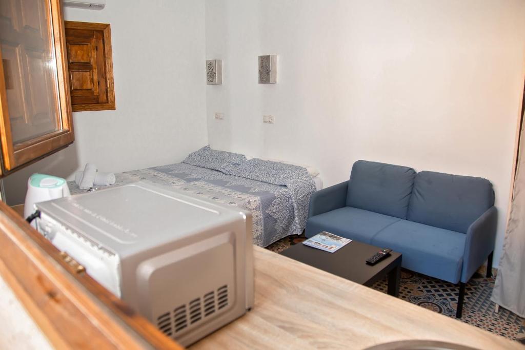 Postel nebo postele na pokoji v ubytování LA CASA MORISCA