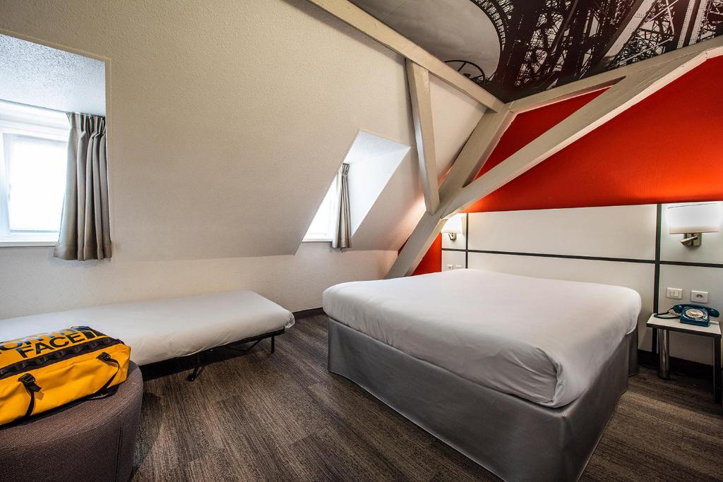 Postel nebo postele na pokoji v ubytování Ibis Styles Strasbourg Centre Gare