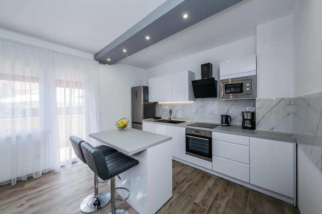 Kuchyňa alebo kuchynka v ubytovaní Luxury Apartment Maris